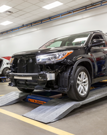 Toyota on vehicle lift | Motor Inn Toyota Of Carroll in Carroll IA